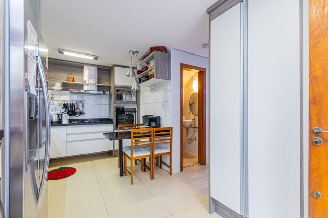 Imagem Casa de Condomínio com 3 Quartos à Venda, 168 m² em Santo Antônio - Porto Alegre