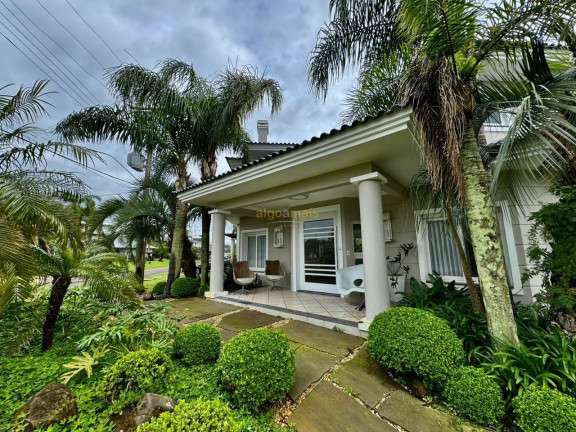 Imagem Casa com 4 Quartos à Venda, 428 m² em Condominio Atlantida Lagos Park - Xangri-lá Imagem Casa com 4 Quartos à Venda, 428 m² em Condominio Atlantida Lagos Park - Xangri-lá