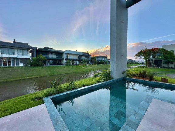 Imagem Casa com 5 Quartos à Venda, 385 m² em Condominio Capao Ilhas Resort - Capão Da Canoa Imagem Casa com 5 Quartos à Venda, 385 m² em Condominio Capao Ilhas Resort - Capão Da Canoa
