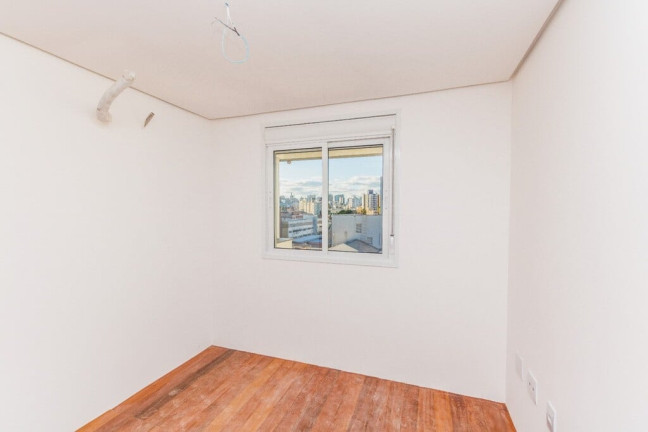 Imagem Apartamento com 2 Quartos à Venda, 70 m² em Menino Deus - Porto Alegre