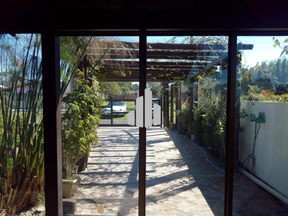 Imagem Casa com 2 Quartos à Venda, 180 m² em Bairro Itapeva - Torres