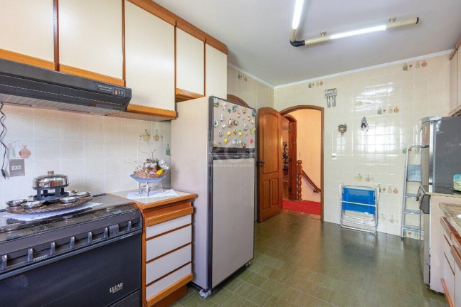Imagem Casa com 4 Quartos à Venda, 725 m² em Vila Assunção - Porto Alegre