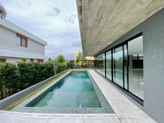 Imagem Casa de Condomínio com 6 Quartos à Venda, 482 m² em Zona Nova - Capão Da Canoa