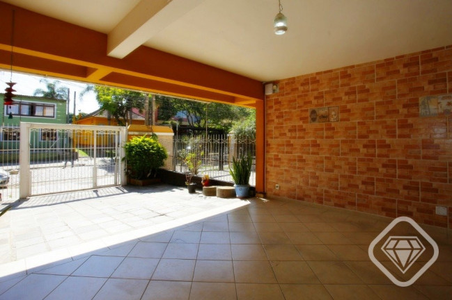 Imagem Casa com 4 Quartos à Venda, 265 m² em Ipanema - Porto Alegre