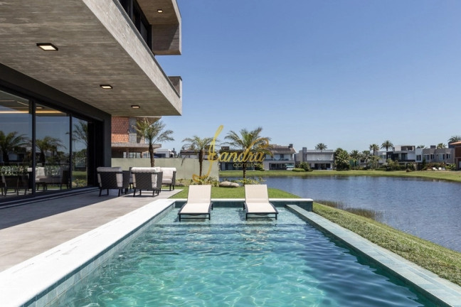 Imagem Casa de Condomínio com 5 Quartos à Venda, 387 m² em Centro - Xangri-la