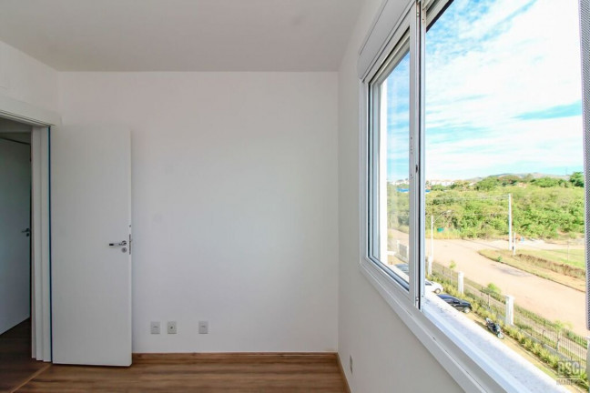 Imagem Imóvel com 2 Quartos à Venda, 58 m² em Vila Nova - Porto Alegre Imagem Imóvel com 2 Quartos à Venda, 58 m² em Vila Nova - Porto Alegre