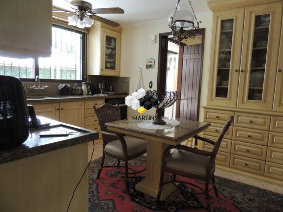 Imagem Casa com 4 Quartos à Venda, 430 m² em Vila Assunção - Porto Alegre