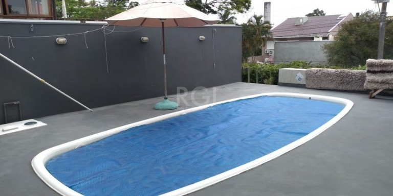 Imagem Casa de Condomínio com 4 Quartos à Venda, 380 m² em Ipanema - Porto Alegre