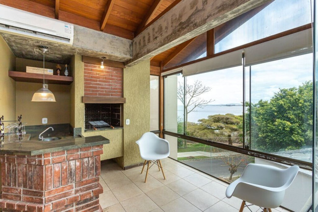 Imagem Casa de Condomínio com 3 Quartos à Venda, 200 m² em Vila Assunção - Porto Alegre
