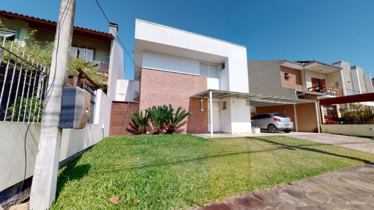 Imagem Imóvel com 3 Quartos à Venda,  em Campo Novo - Porto Alegre