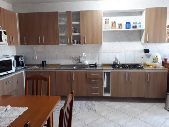 Imagem Sobrado com 5 Quartos à Venda, 210 m² em Rubem Berta - Porto Alegre
