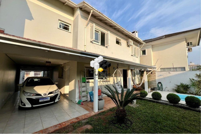 Imagem Casa com 4 Quartos à Venda, 243 m² em Moinhos De Vento - Canoas