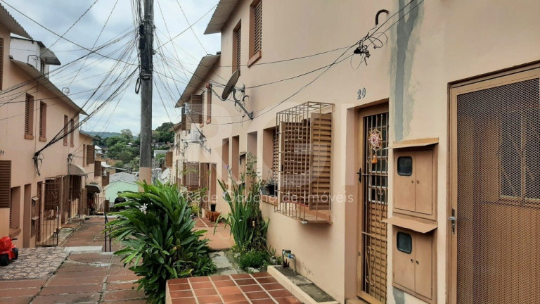 Imagem Casa de Condomínio com 1 Quarto à Venda, 61 m² em Vila São José - Porto Alegre