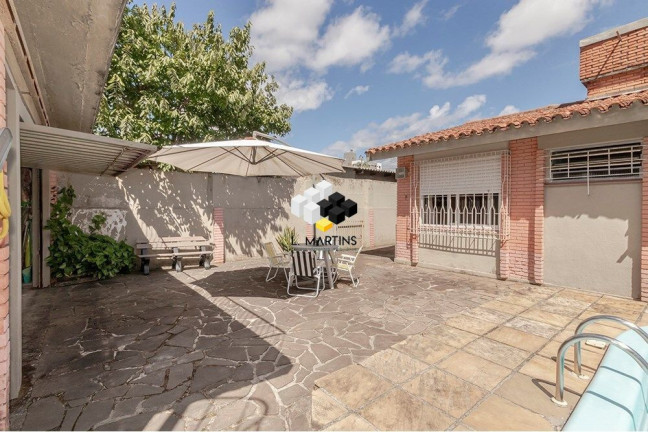 Imagem Casa com 4 Quartos à Venda, 381 m² em Camaquã - Porto Alegre Imagem Casa com 4 Quartos à Venda, 381 m² em Camaquã - Porto Alegre