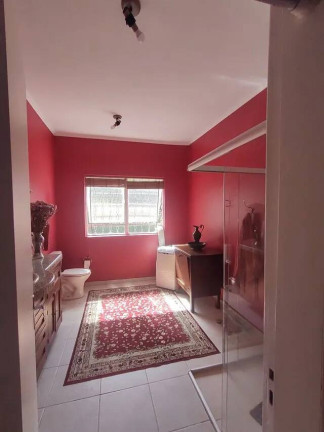 Imagem Casa com 4 Quartos à Venda, 329 m² em Vila Nova - Porto Alegre