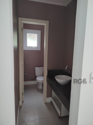 Imagem Sobrado com 3 Quartos à Venda, 230 m² em Lomba Do Pinheiro - Porto Alegre