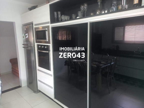 Imagem Casa com 4 Quartos à Venda, 325 m² em Champagnat - Londrina