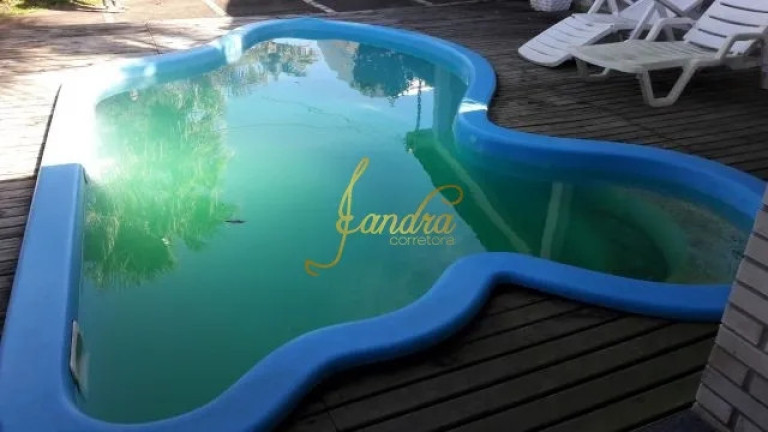 Imagem Casa com 3 Quartos à Venda, 250 m² em Centro - Xangri-la