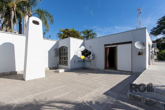 Imagem Casa com 3 Quartos à Venda, 580 m² em Santa Tereza - Porto Alegre Imagem Casa com 3 Quartos à Venda, 580 m² em Santa Tereza - Porto Alegre