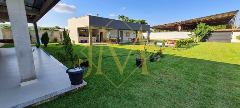 Imagem Chácara com 4 Quartos à Venda, 1.500 m² em Caratinga