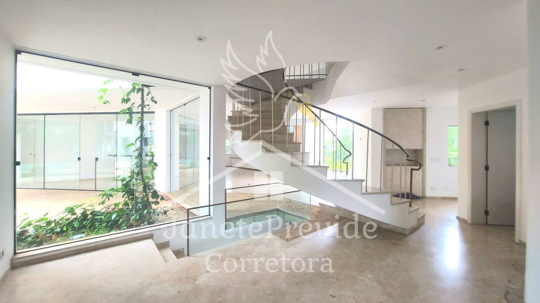Imagem Casa de Condomínio com 4 Quartos à Venda, 780 m² em Alphaville - Barueri