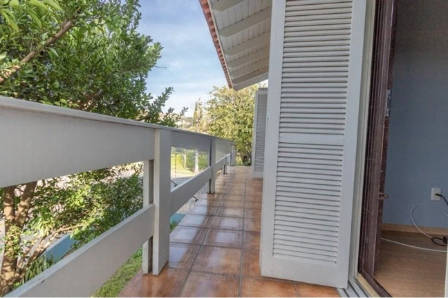 Imagem Casa com 4 Quartos à Venda, 239 m² em Nonoai - Porto Alegre