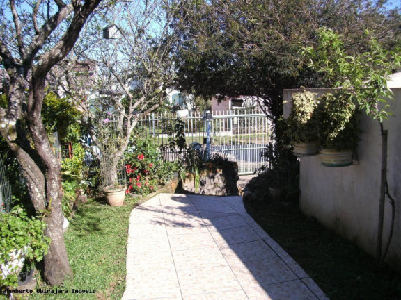 Imagem Casa com 5 Quartos à Venda, 216 m² em Pé De Plátano - Santa Maria