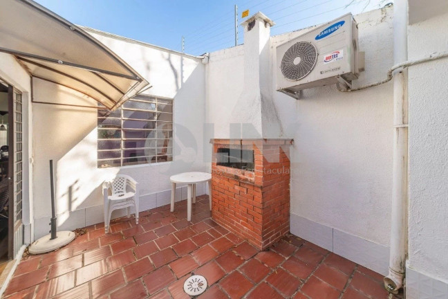 Imagem Casa com 4 Quartos à Venda, 299 m² em Santana - Porto Alegre