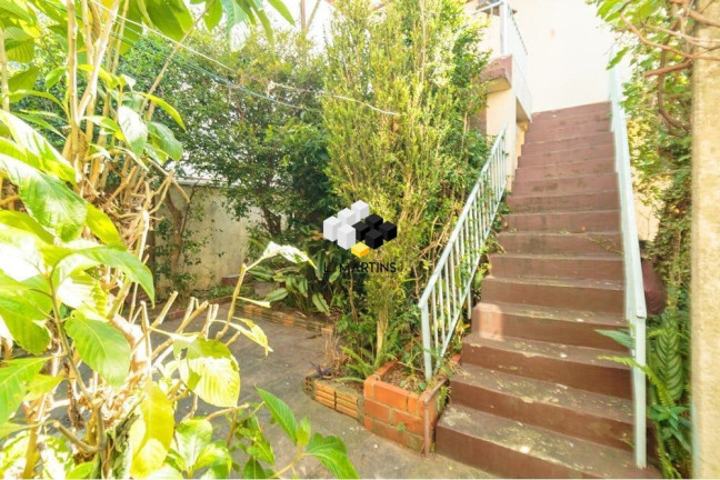 Imagem Casa com 3 Quartos à Venda, 195 m² em Santa Maria Goretti - Porto Alegre Imagem Casa com 3 Quartos à Venda, 195 m² em Santa Maria Goretti - Porto Alegre
