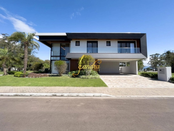 Imagem Casa de Condomínio com 6 Quartos à Venda, 588 m² em Zona Nova - Capão Da Canoa