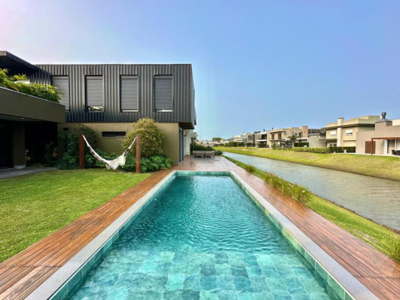 Imagem Casa com 6 Quartos à Venda, 500 m² em Novo Louro - Capao Da Canoa Imagem Casa com 6 Quartos à Venda, 500 m² em Novo Louro - Capao Da Canoa