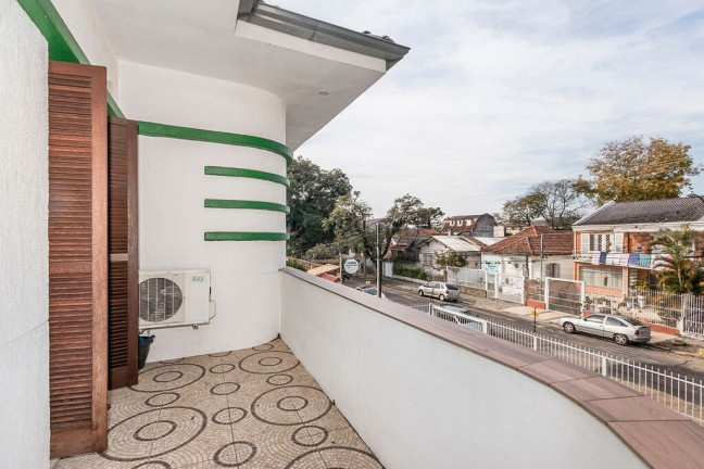 Imagem Casa com 4 Quartos à Venda, 243 m² em Partenon - Porto Alegre