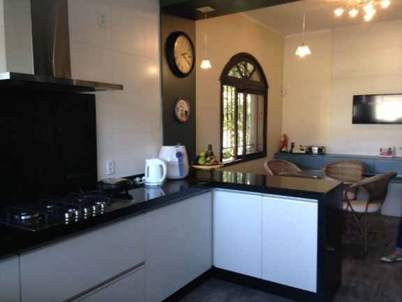 Imagem Casa com 3 Quartos à Venda, 339 m² em Ipanema - Porto Alegre