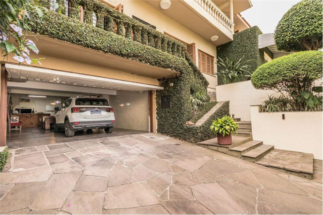 Imagem Casa com 4 Quartos à Venda,  em Três Figueiras - Porto Alegre