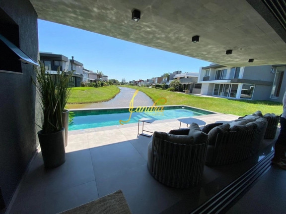 Imagem Casa de Condomínio com 5 Quartos à Venda, 428 m² em Capão Ilhas Resort - Capão Da Canoa