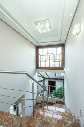 Imagem Casa com 4 Quartos à Venda, 288 m² em Jardim Itu - Porto Alegre