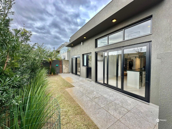 Imagem Casa de Condomínio com 4 Quartos à Venda, 160 m² em Centro - Xangri-lá