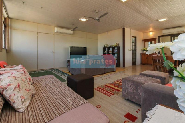 Imagem Casa com 7 Quartos à Venda, 330 m² em Nonoai - Porto Alegre