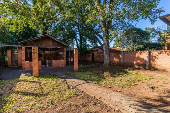 Imagem Casa com 9 Quartos à Venda, 316 m² em Três Figueiras - Porto Alegre Imagem Casa com 9 Quartos à Venda, 316 m² em Três Figueiras - Porto Alegre