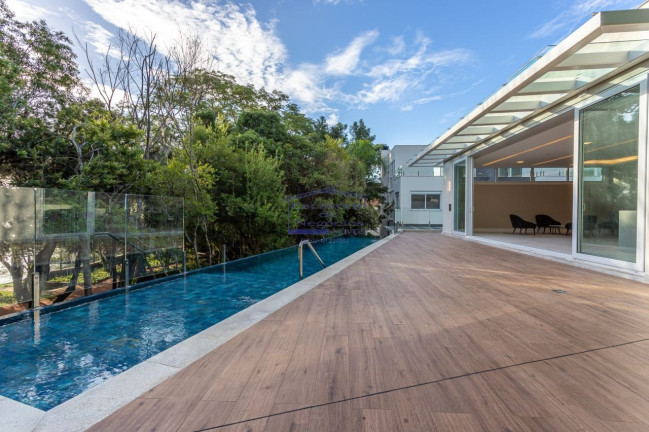 Imagem Casa com 3 Quartos à Venda, 344 m² em Pedra Redonda - Porto Alegre