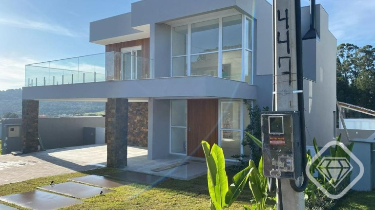 Imagem Casa de Condomínio com 4 Quartos à Venda,  em Vila Nova - Porto Alegre