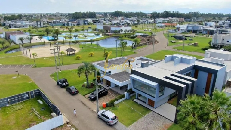 Imagem Casa de Condomínio com 5 Quartos à Venda, 310 m² em Zona Nova - Capão Da Canoa