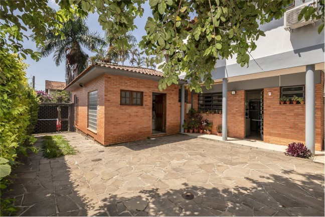 Imagem Casa com 4 Quartos à Venda, 250 m² em Três Figueiras - Porto Alegre Imagem Casa com 4 Quartos à Venda, 250 m² em Três Figueiras - Porto Alegre