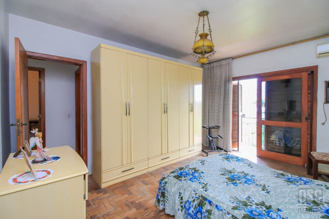 Imagem Casa com 3 Quartos à Venda, 299 m² em Glória - Porto Alegre