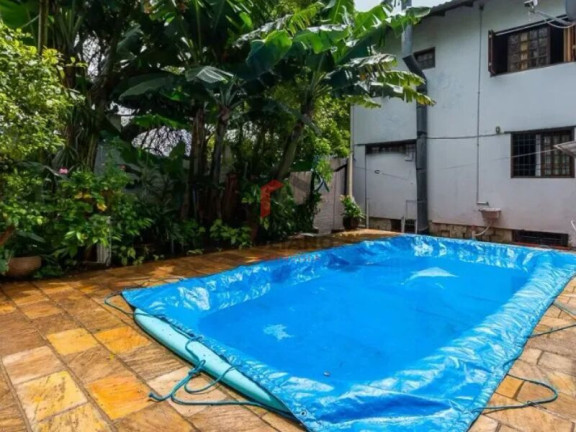 Imagem Casa com 4 Quartos à Venda, 280 m² em Vila Jardim - Porto Alegre