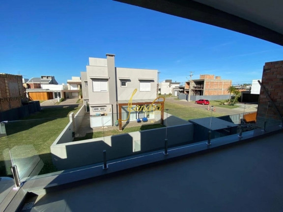 Imagem Casa de Condomínio com 4 Quartos à Venda, 228 m² em Centro - Xangri-la