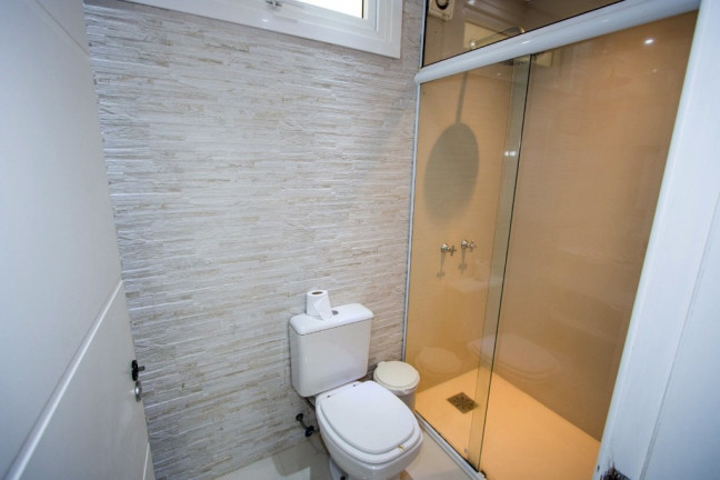Imagem Casa de Condomínio com 4 Quartos à Venda, 380 m² em Ipanema - Porto Alegre