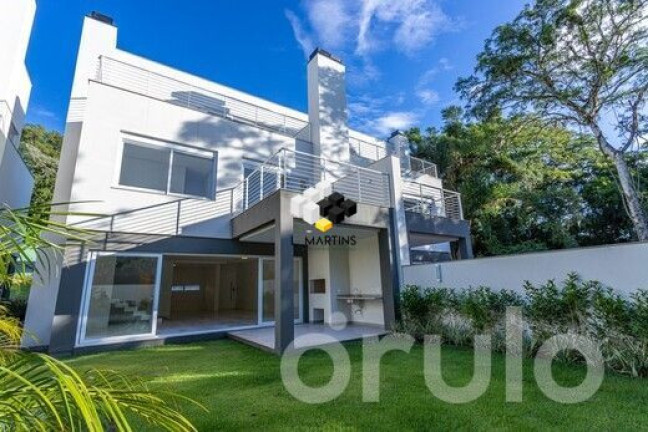 Imagem Casa de Condomínio com 3 Quartos à Venda, 441 m² em Pedra Redonda - Porto Alegre