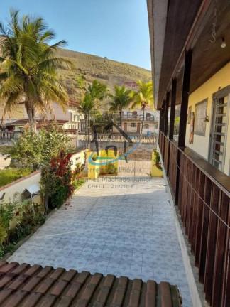 Imagem Sobrado com 6 Quartos à Venda,  em Martim De Sá - Caraguatatuba