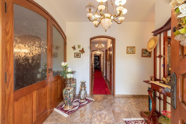 Imagem Casa com 4 Quartos à Venda, 725 m² em Vila Assunção - Porto Alegre